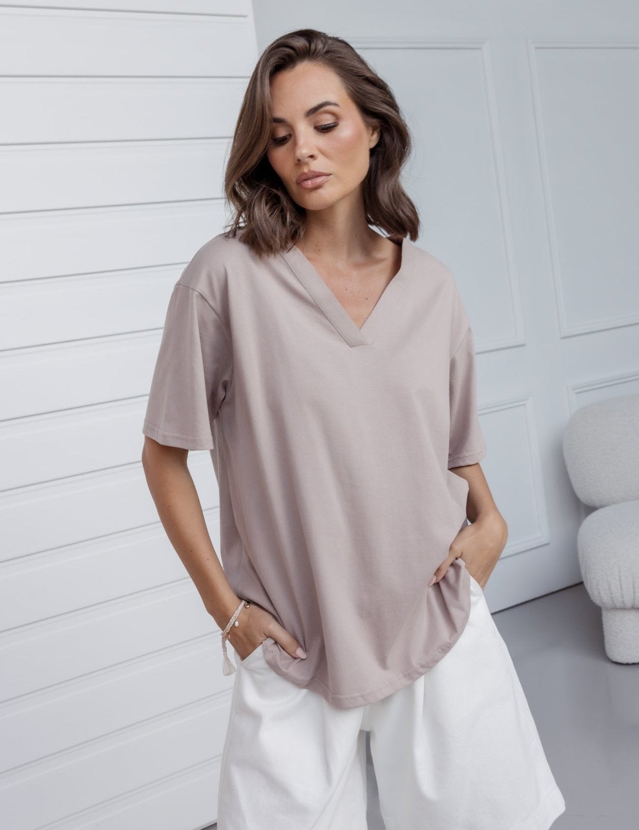 Woman wearing the NIX V-Neck T-Shirt in Coco by ALEXANDRA